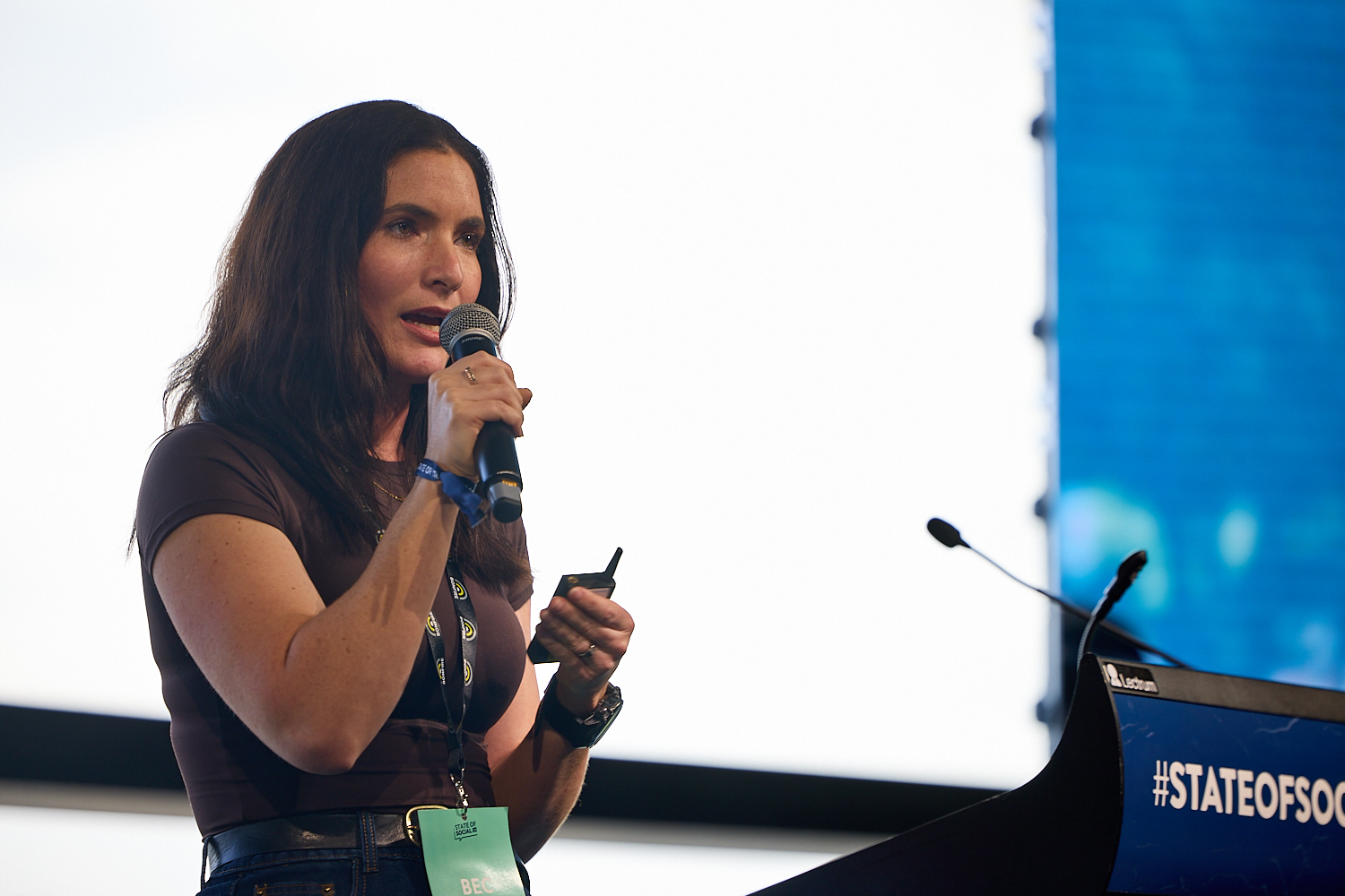 Bec Smith on stage at SOS24: Don’t despair, small budgets can unlock big ideas!
