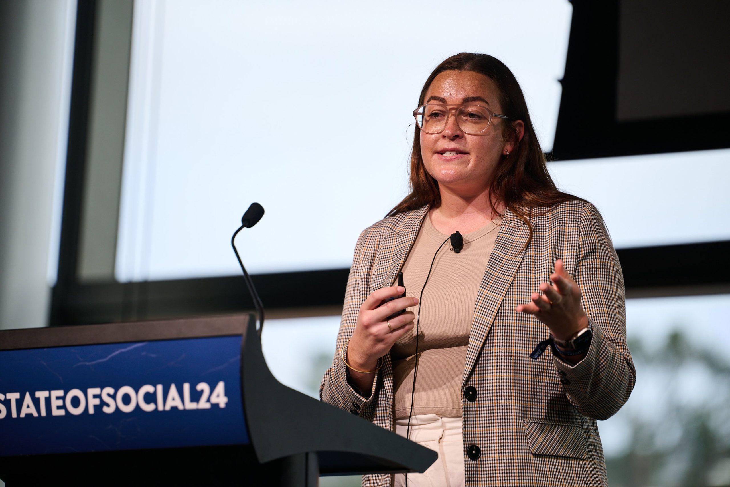 Emma Hollins on stage at SOS24: The alchemy of experience design